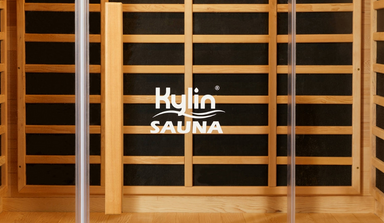 Wooden sauna interior with 'Kylin Sauna' logo displayed
